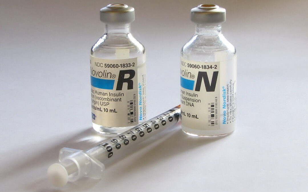 Insulin bottle and syringe