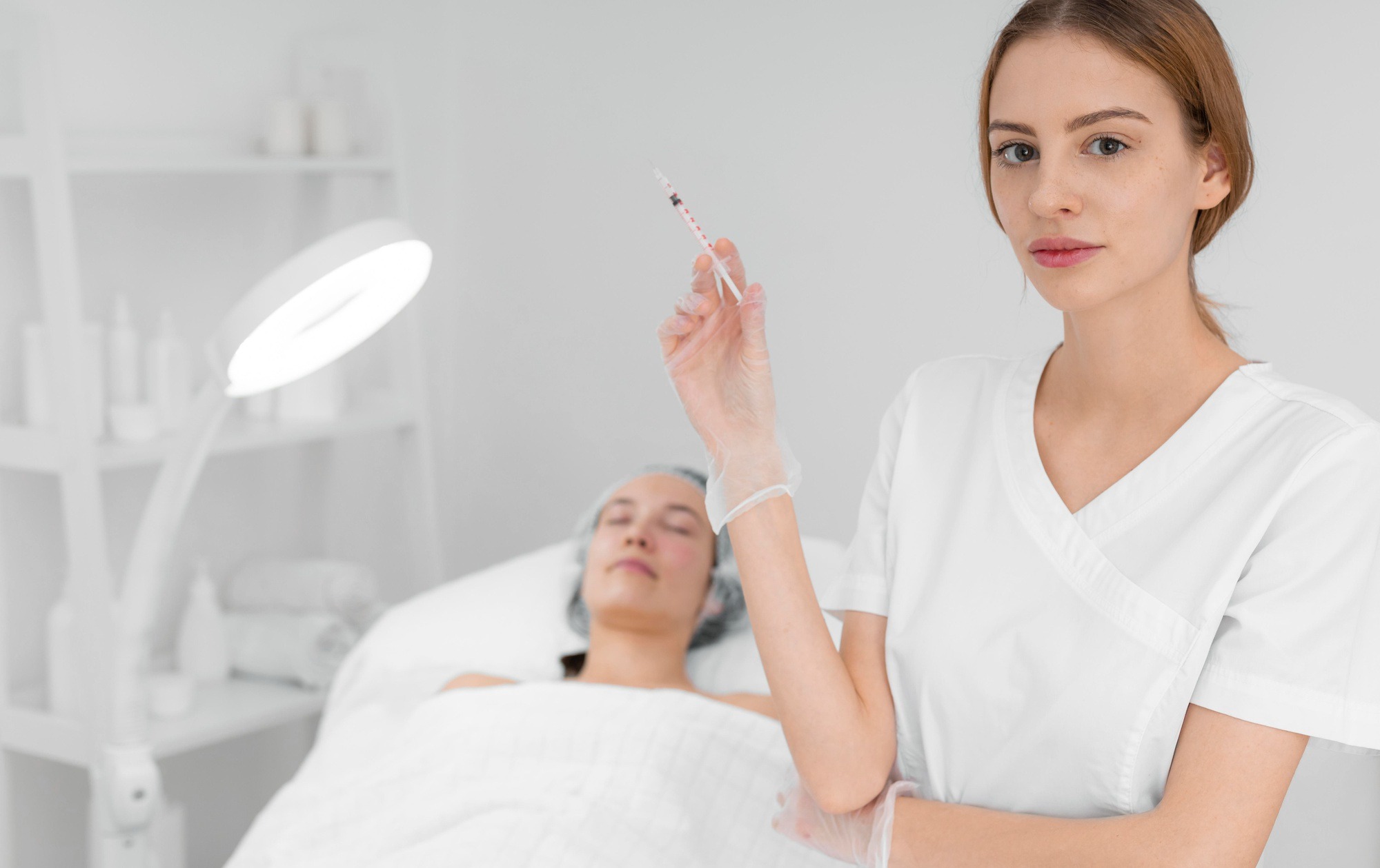 beautician makes injection filler on customer in salon