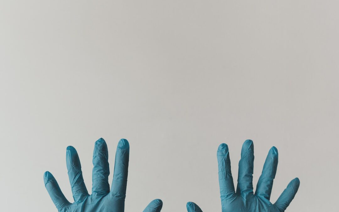Hands wearing gloves