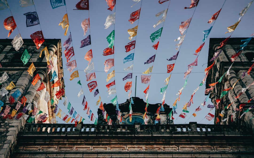 Mexican small flags on a building