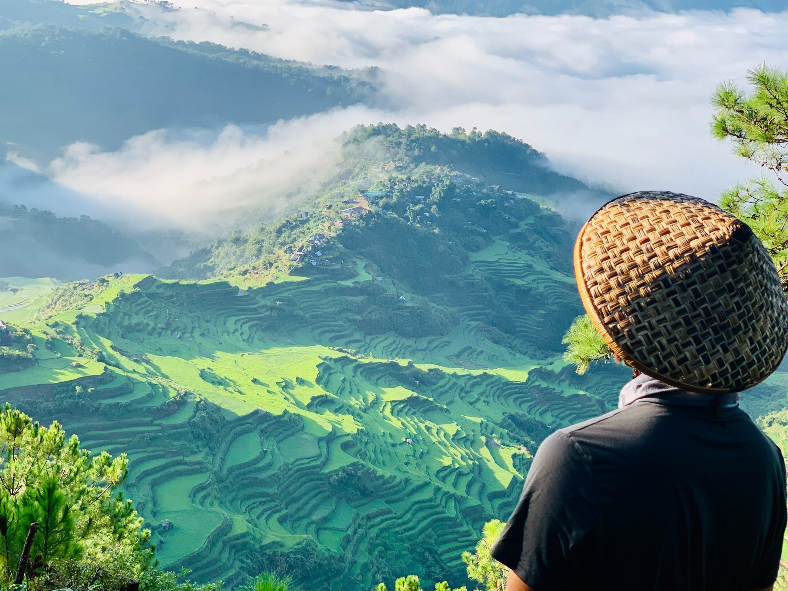 A guy is looking at the mountain in the Philippines