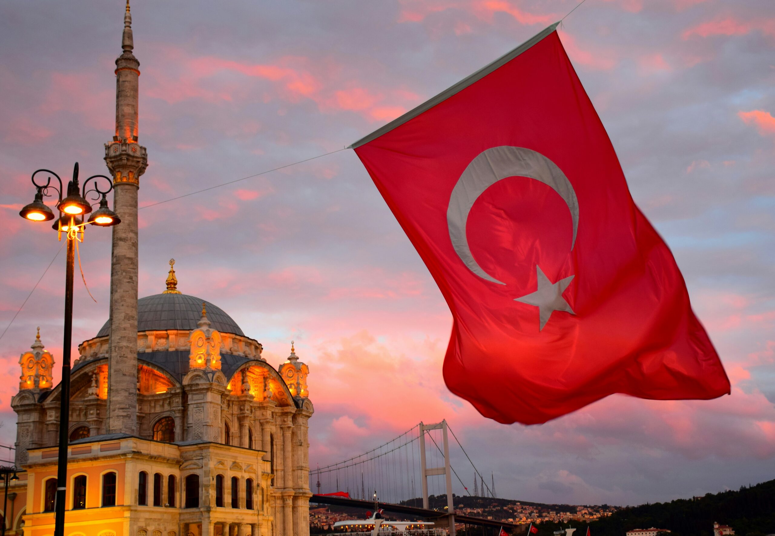 Turkey OTC Market Development: Consumer Healthcare Trends and Market Outlook to 2040 red flag on top of brown concrete building during daytime