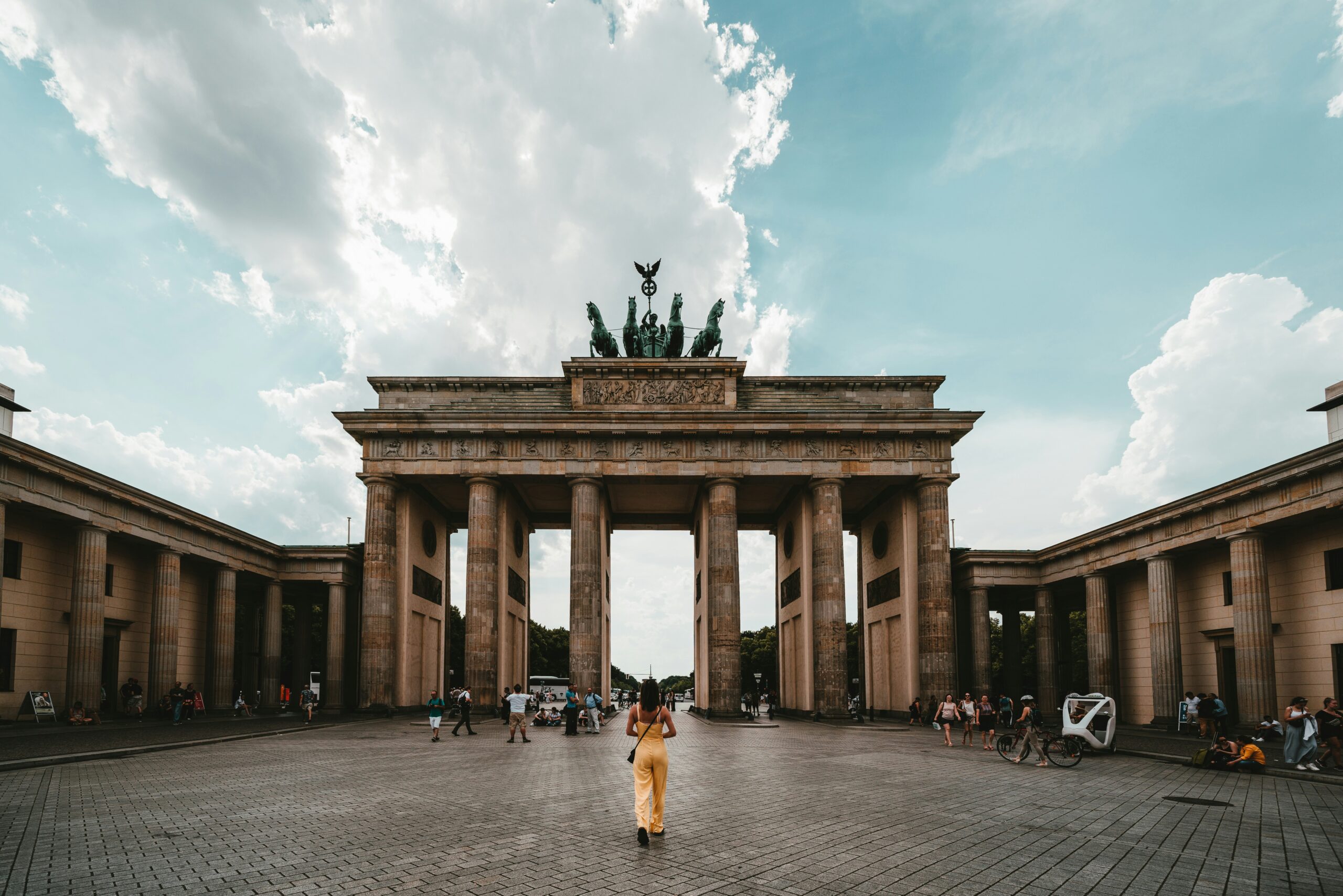 woman standing near brandenburger tor in Berlin