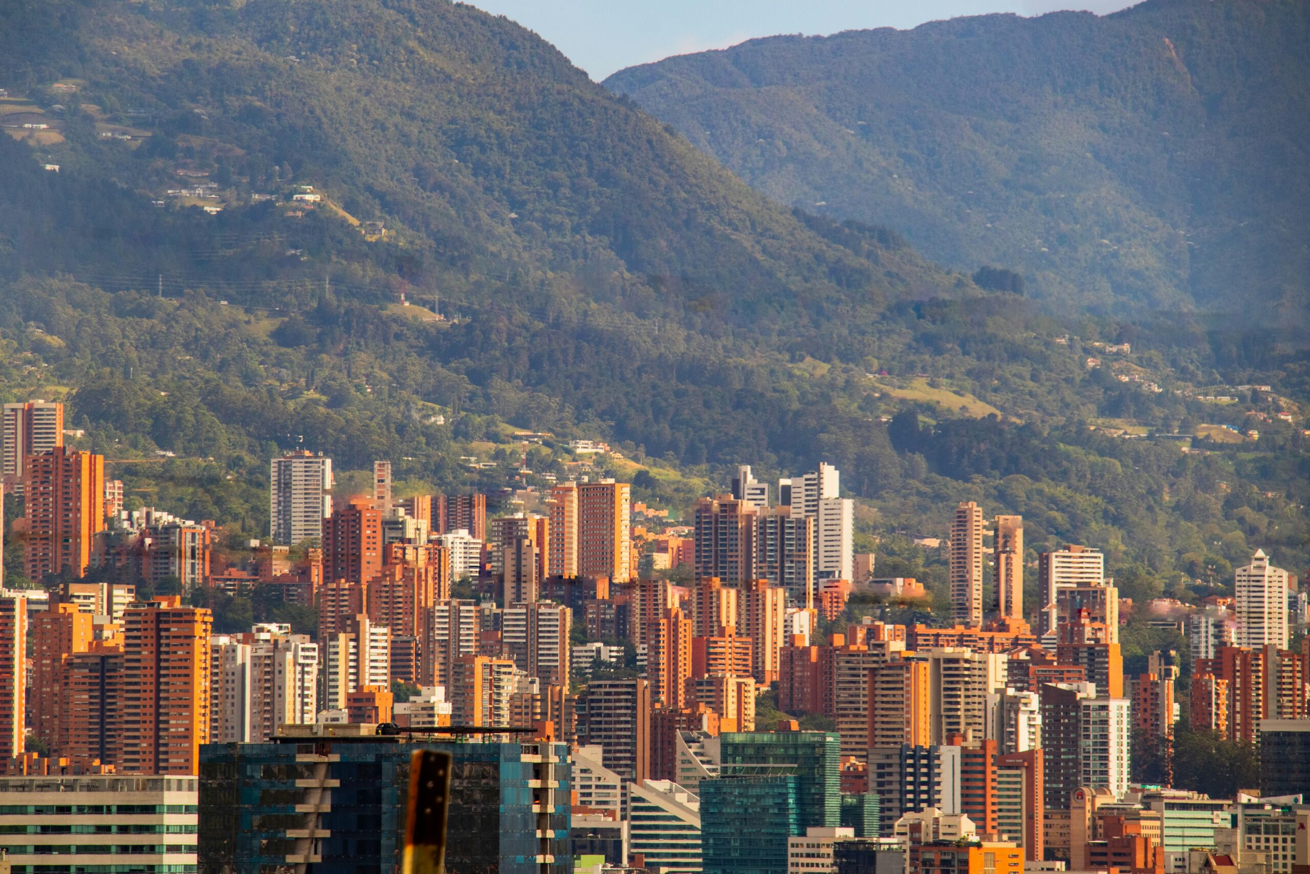 Andean Cosmetics Market 2040: Entry Across Colombia, Peru & Ecuador a view of a city with mountains in the background