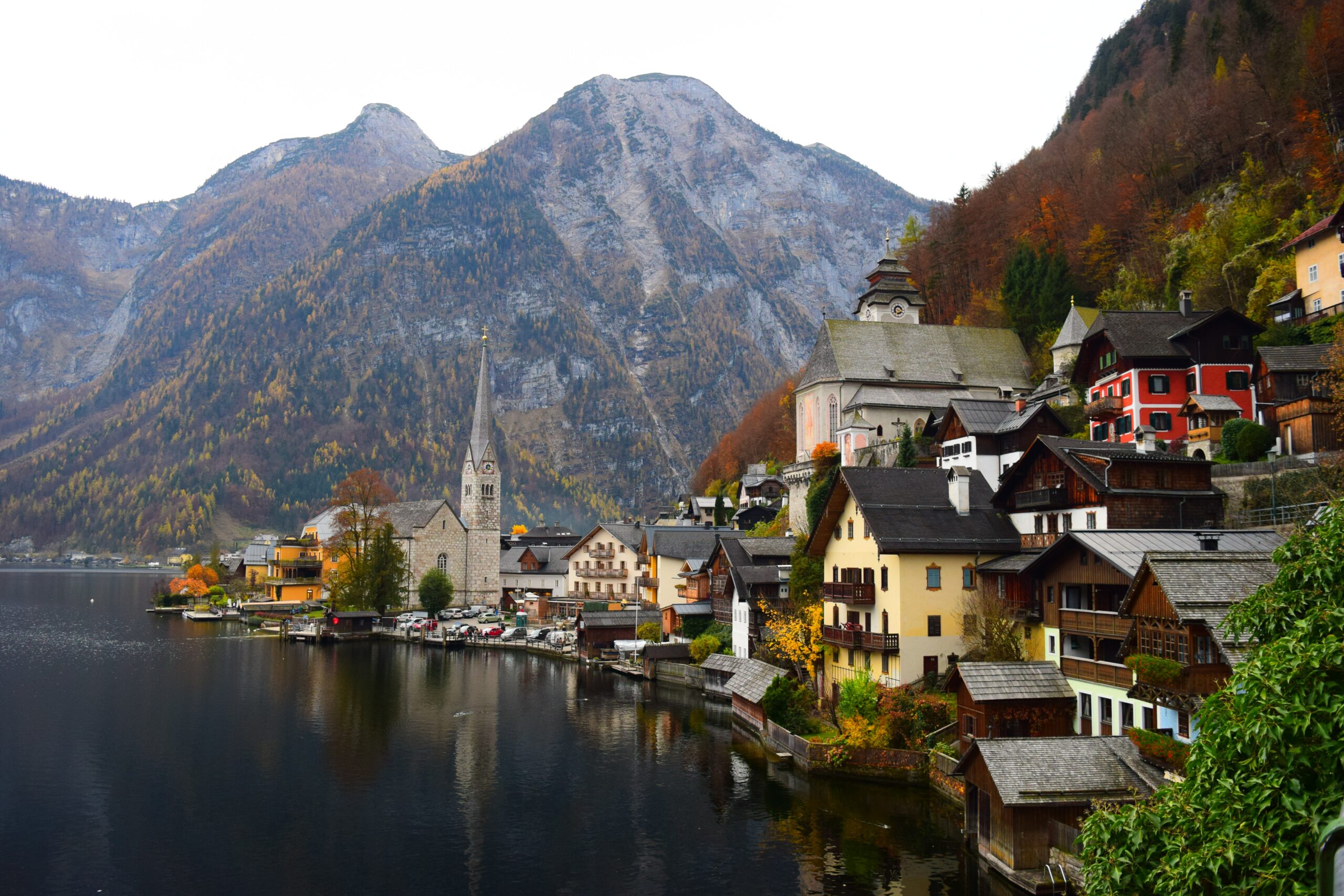 Autumnal view of the town of Hallstatt in Autria, with typical houses overlooking a lake