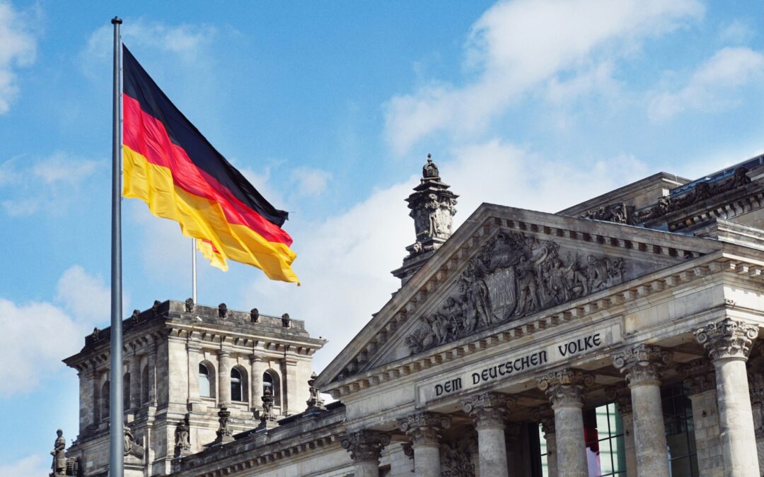 Parliament in Berlin, Germany, with the German flag in the wind