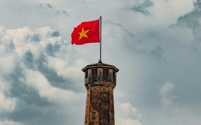Picture of a Vietnamese Flag on the Top of a Tower