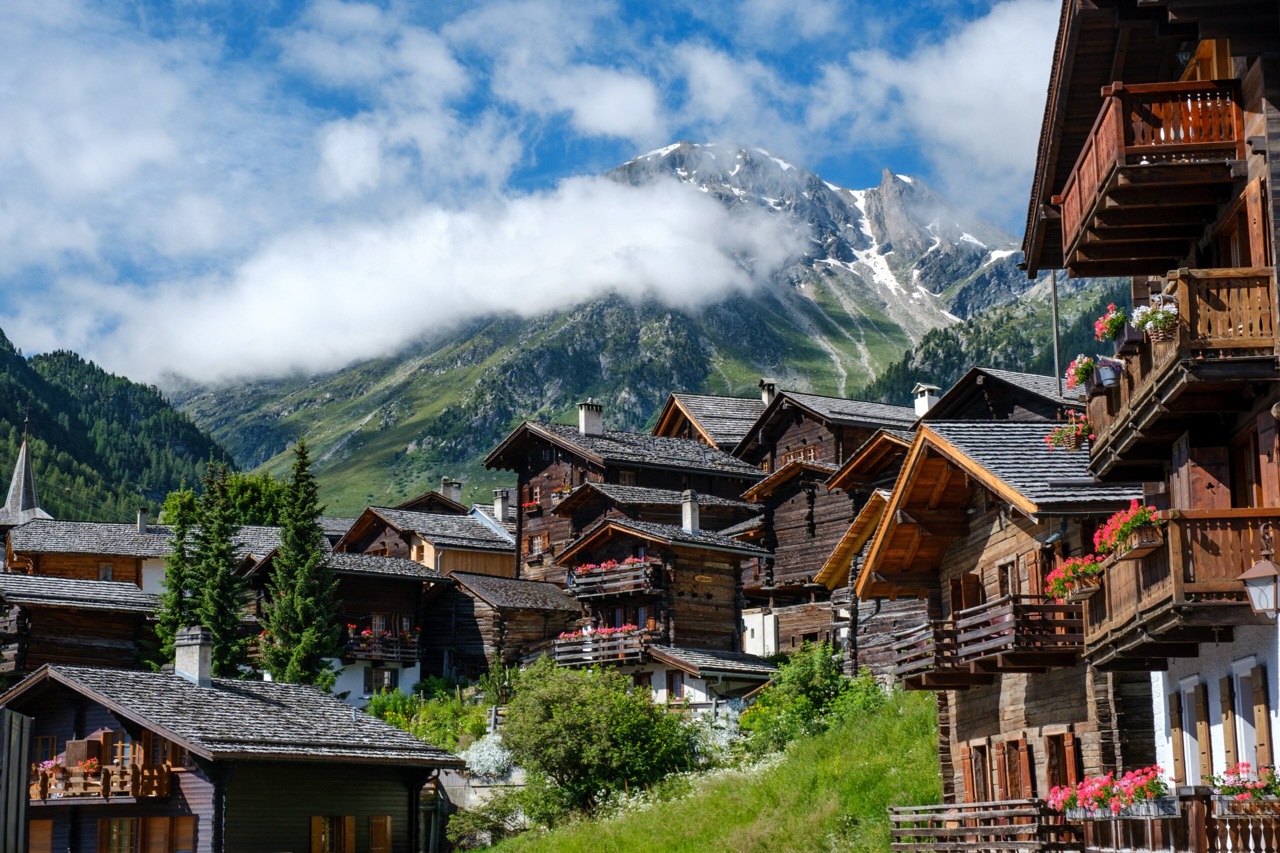 Traditionnal wooden houses in the mountains in Switzerland during summer