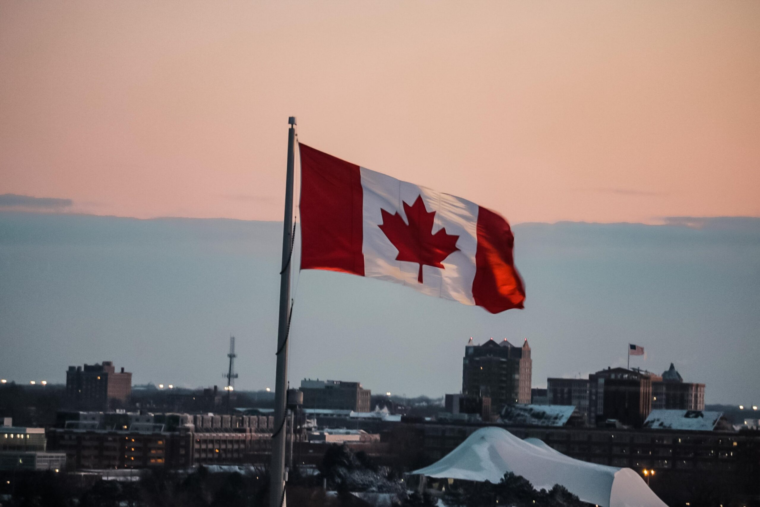 Canadian flag at the sunset