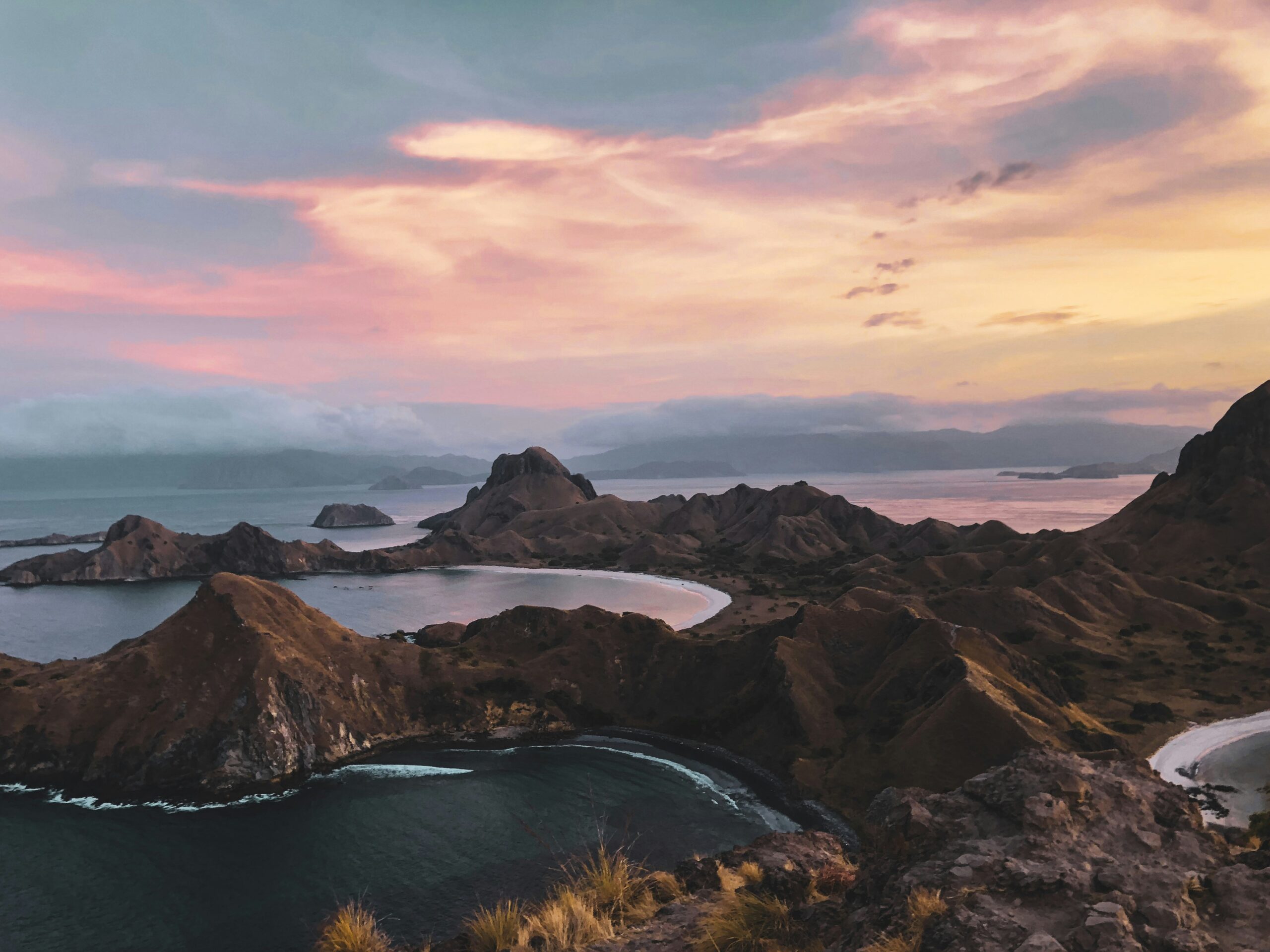A view of the komodo islands with a sunset